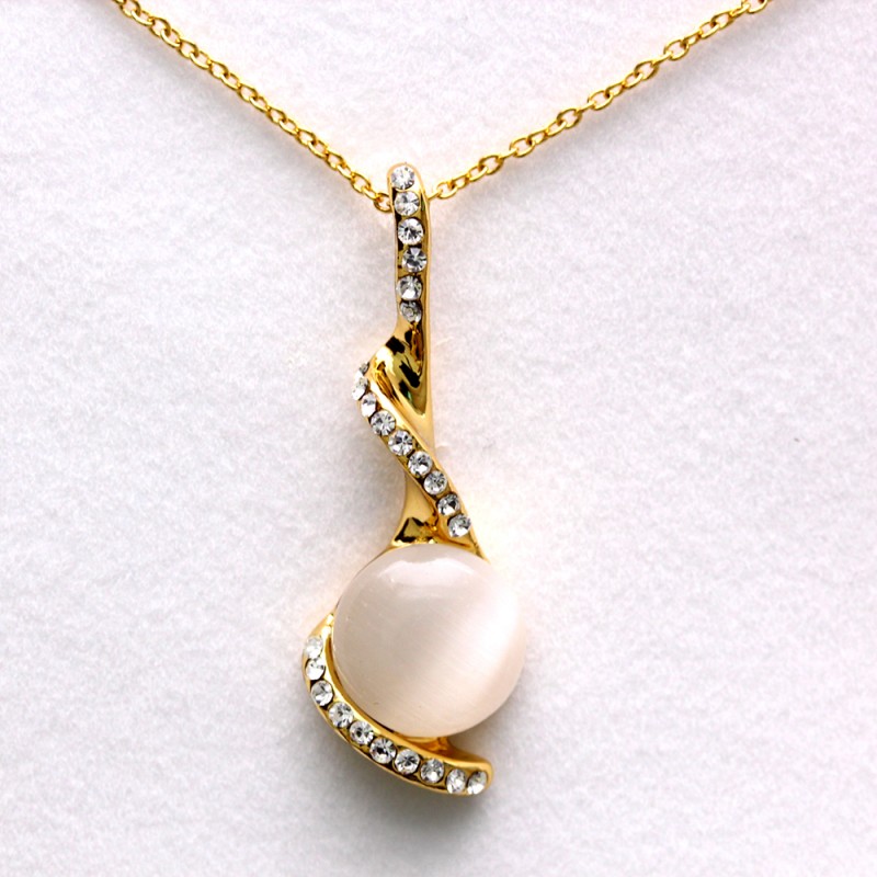gold necklace with stone pendant